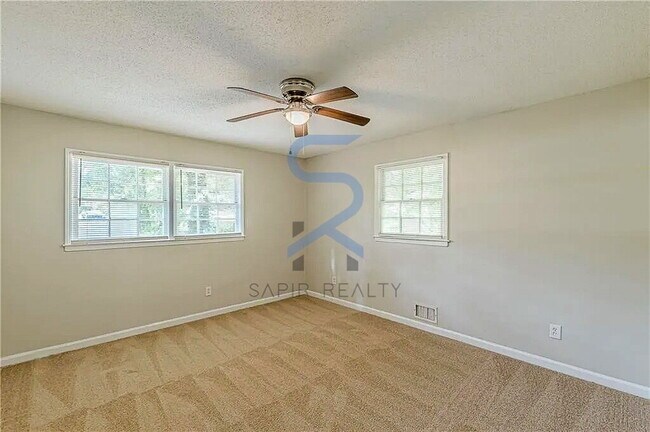 Building Photo - Move in before December 31st and choose your reward: a $250 Amazon Gift Card or a 55" Smart TV!