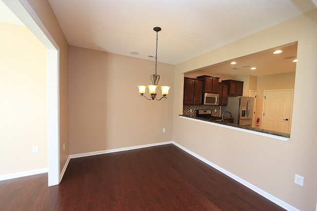Building Photo - Upgraded End Unit Townhome in Brier Creek!