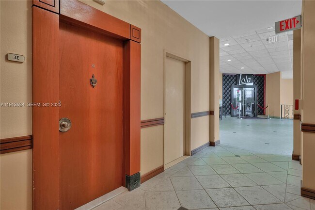 Building Photo - 5555 Collins Ave