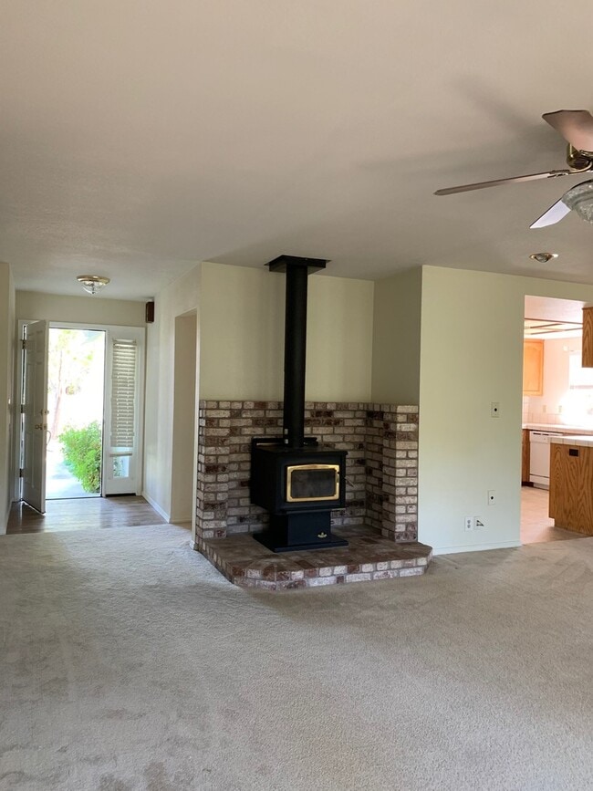Building Photo - Spacious 3-Bedroom Home with Greenbelt Views & Landscaping Included