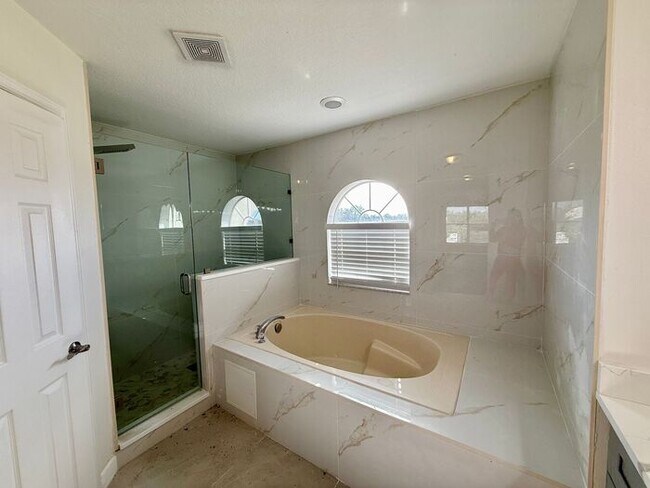 Building Photo - GORGEOUS, Large Completely Renovated Two-Story 4/2.5 PLUS LOFT in POINCIANA VILLAGES!