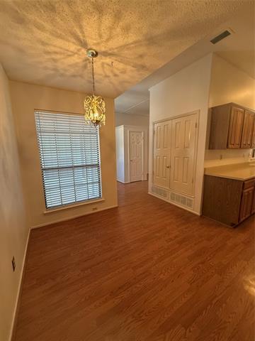 Building Photo - 5210 Manhassett Dr