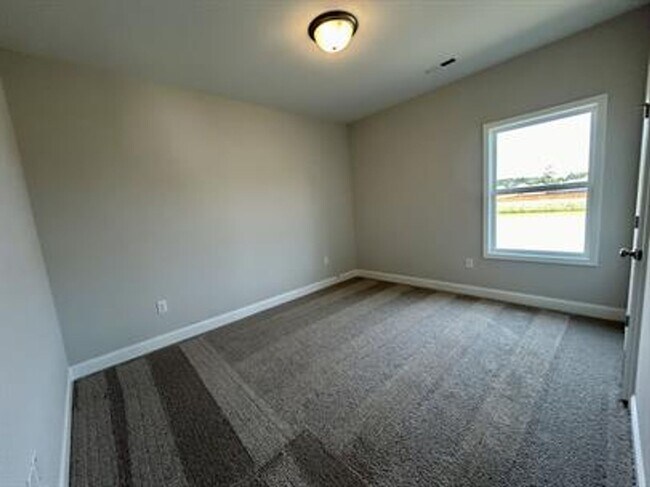Building Photo - Relax & Unwind in This Peaceful 4 Bedroom ...