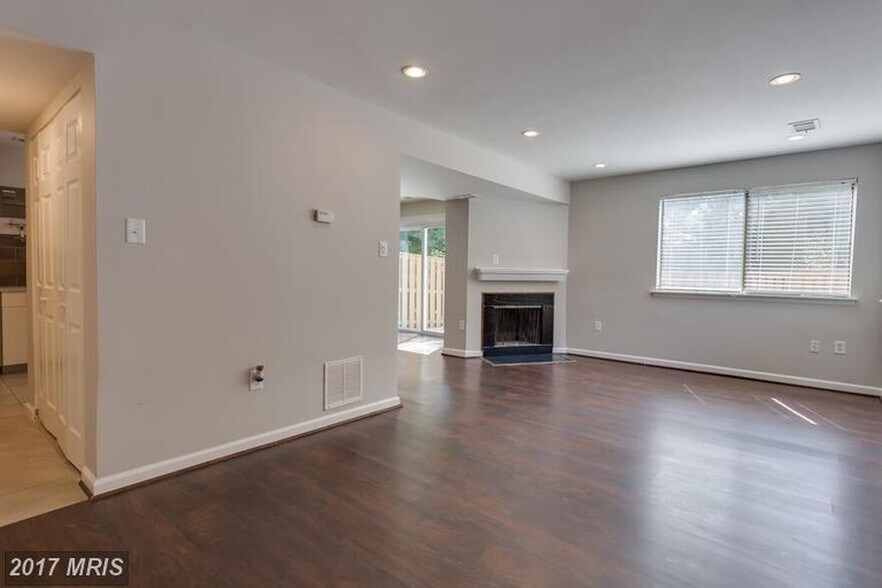 Living Room with Fireplace - 5735 Nordeen Oak Ct