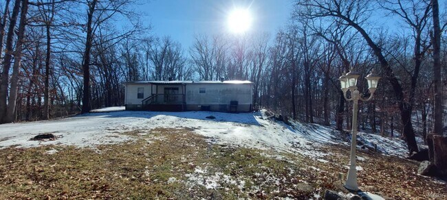 Building Photo - 1401 Wilderness Acres Ln