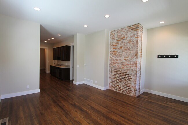 Building Photo - Midtown Renovated Duplex - Hardwood Floors, Exposed Brick