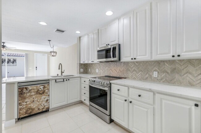 Building Photo - Annual Rental in San Remo at Palmira –4BR/...