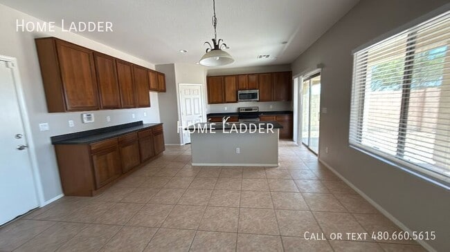Building Photo - 4703 S 99th Dr