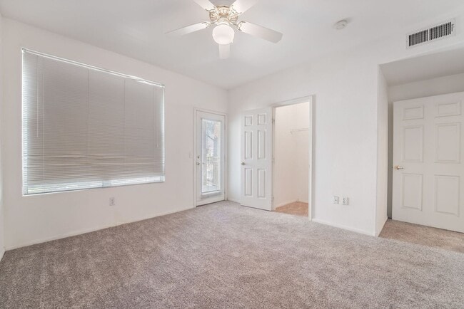 Building Photo - Spacious 3-Bedroom Condo with Garage and Two Private Patios!