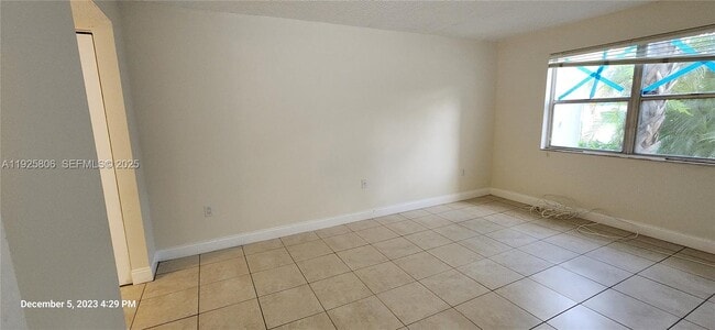 Building Photo - 4235 N University Dr