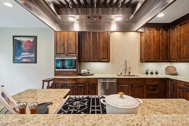 Building Photo - 2 Creeks Condominiums - Gated Community on...