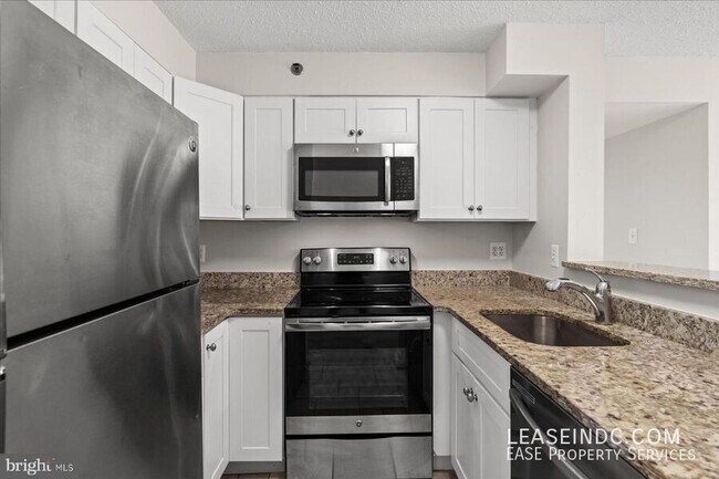 Building Photo - 1230 23rd St NW