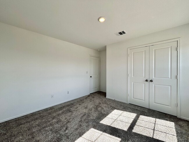 Building Photo - Spacious 4/BR 2.5/BA Two-Level Home with 3-Car Garage & Covered Deck