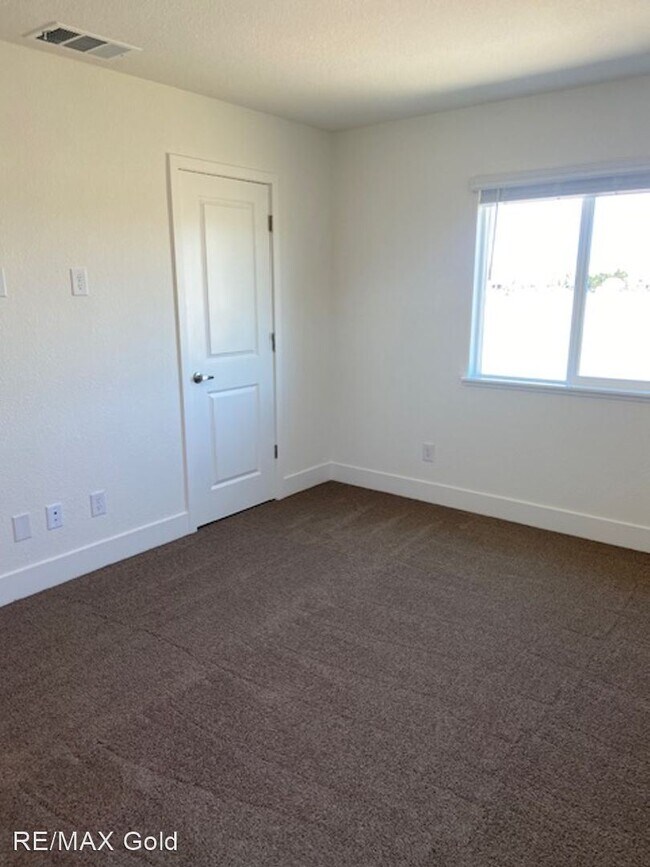 Building Photo - 3 br, 2.5 bath House - 1982 Amazonite Drive