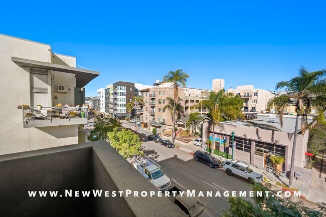 Building Photo - Views, Views, Views! Stunning Top-Floor Little Italy 2-bedroom Loft at The Waterfront!