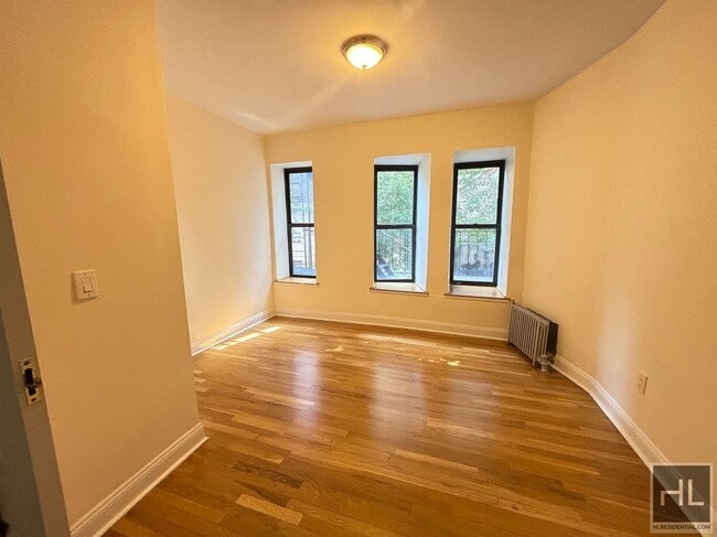 Building Photo - 229-231-231 E 12th St
