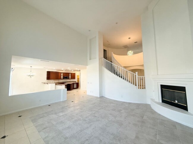 Building Photo - SPACIOUS HOME IN GATED COMMUNITY WITH POOL, RV PARKING & 4-CAR GARAGE!