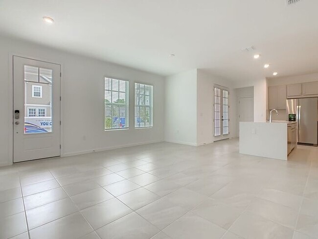 Building Photo - Brand New Luxury Town House in Island Village a Celebration, FL maintenance free community.