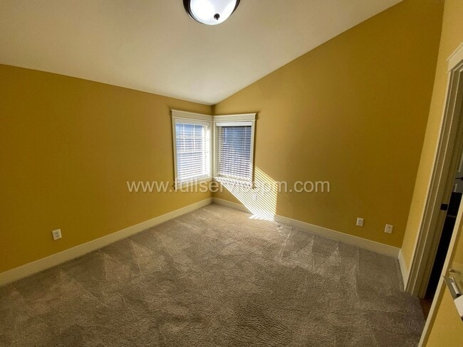 Building Photo - Spacious townhome with private backyard, garage parking, multiple decks, and a dedicated home off...