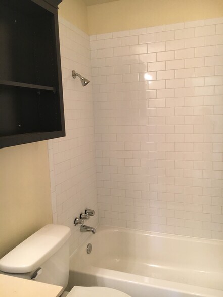 subway tiled full bath - 5802 Tracy Lynn Ln