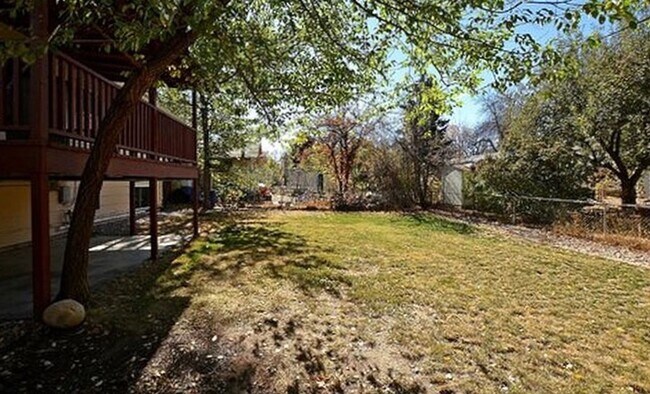Building Photo - AVAILABLE AUGUST! Huge 4 bedroom/2 bath home with large fenced yard
