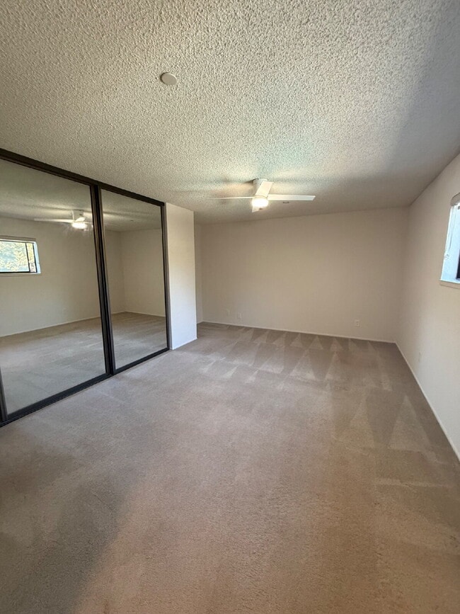 Building Photo - Spacious 3-Bedroom, 2-Bath Multi-Level Home with Balcony, In-Unit Laundry & Dual Parking