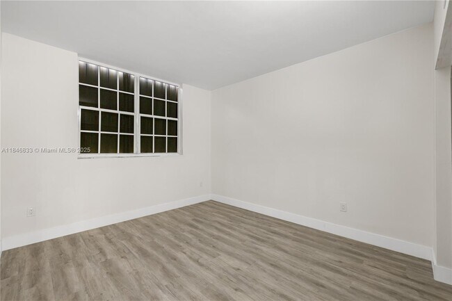 Building Photo - 3860 W 10th Ct