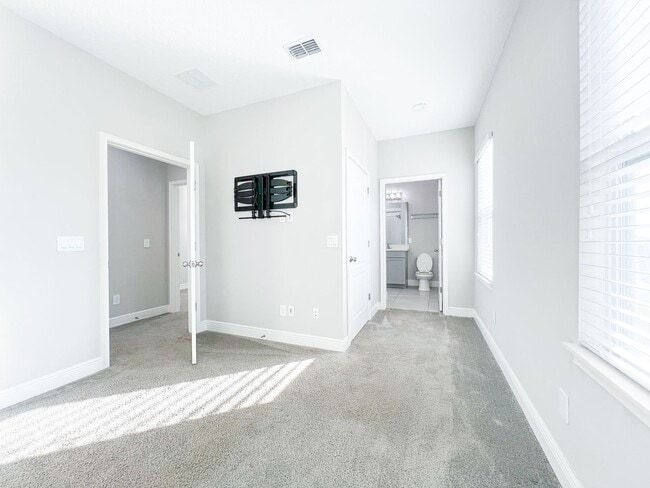 Building Photo - Luxury 4-Bedroom Townhome in Laureate Park – Now Available!
