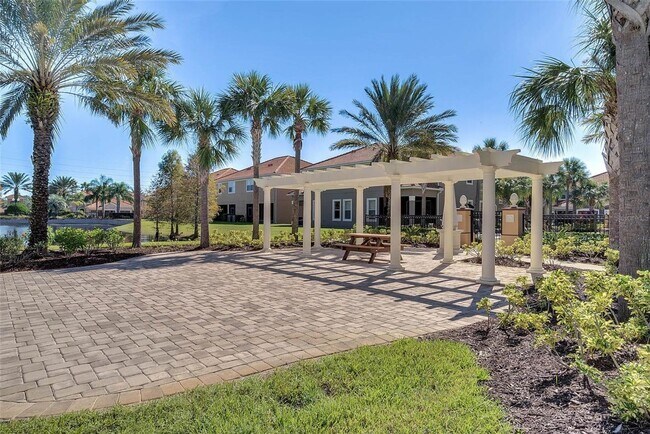 Building Photo - Stylish and Spacious 3/2.5 Townhome with Premium Features and Community Pools