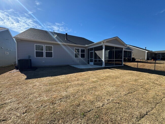 Building Photo - Spacious 1.5-Story 4BR Home with Bonus Room in Active 55+ Community