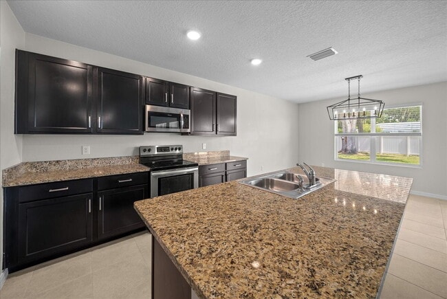 Building Photo - Move-In Ready! Beautiful 4-Bedroom Home with Modern Finishes & Room to Grow