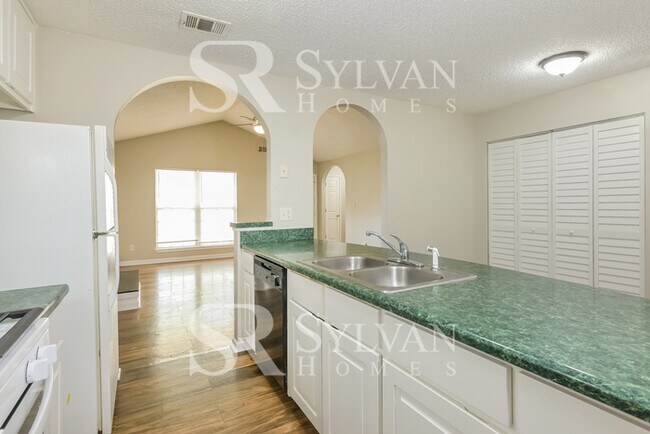 Building Photo - Turn the key. Enter. Smile. Repeat every day!