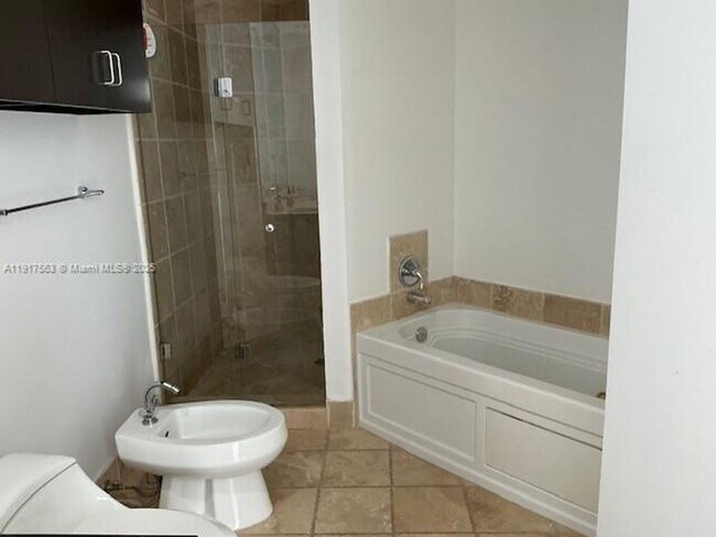 Building Photo - 18201 Collins Ave