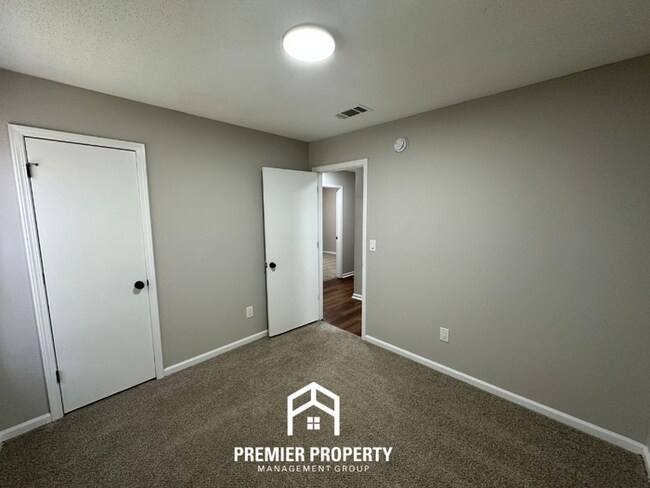 Building Photo - Spacious 4BR/2BA Home in 38141 | Vinyl Flooring & Large Fenced Backyard