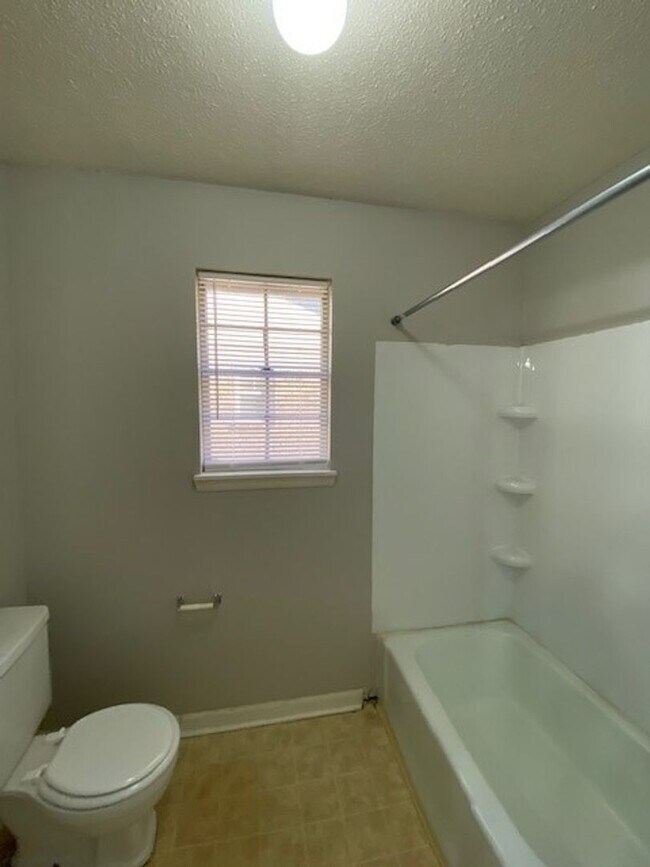 Building Photo - 8211 Woodview Dr N