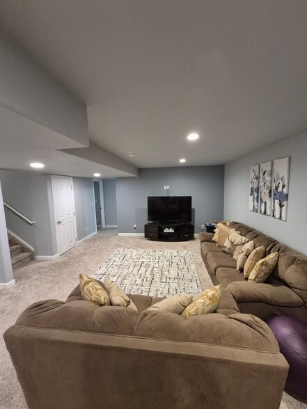 Basement Living room from Exercise Area - 4441 S Johnson Ct