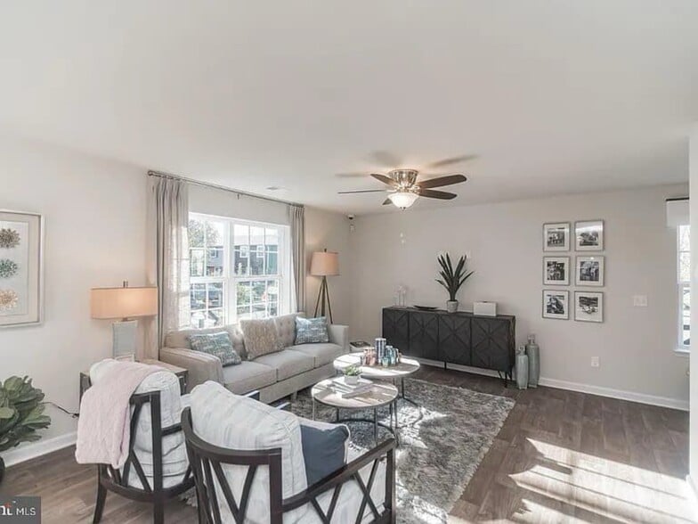 Living room with LVP flooring - 377 Aylesbury Ln