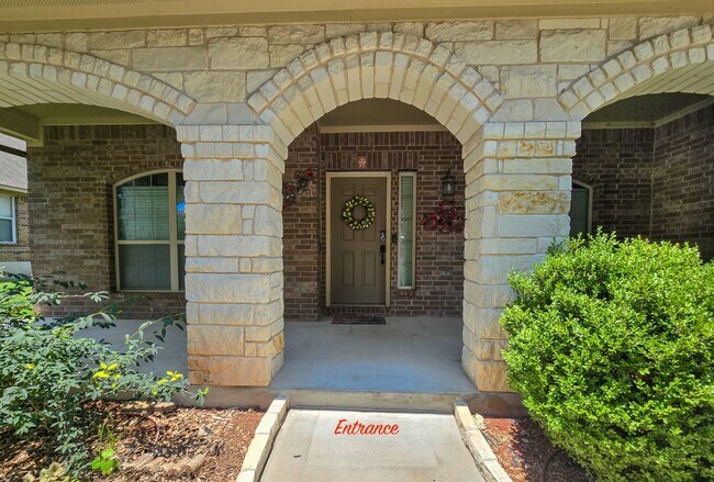The welcoming front porch is perfect for relaxing with a morning coffee or evening glass of wine. - 301 Silver Trl