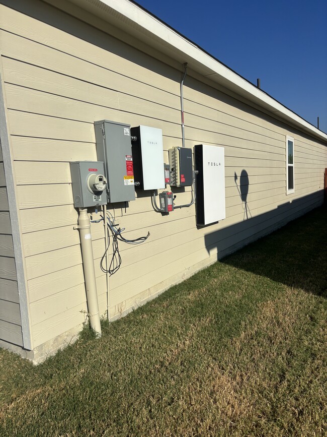 Tesla battery/backup generator - 13504 John Calhoun Dr