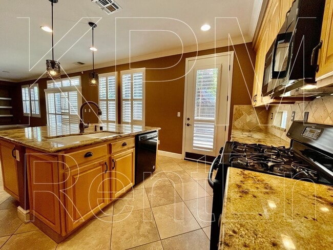 Building Photo - 5879 Riverbank Cir