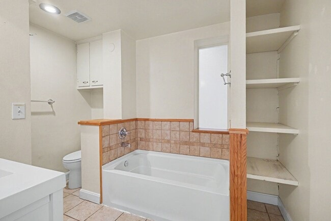 Building Photo - Beautifully Preserved Englewood Home with Fenced Backyard