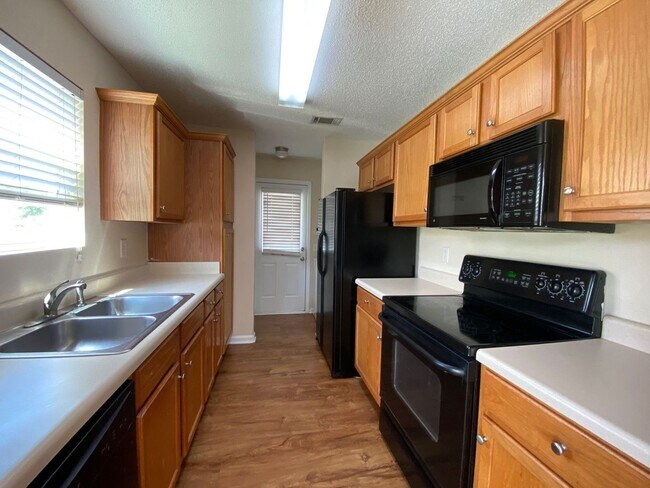 Building Photo - PRE-LEASING FOR AUGUST 2025!  1/2 OFF SECU...