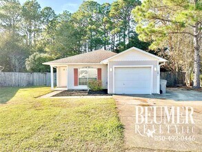 Building Photo - 7 mo Lease Charming Home with Spacious Backyard and Modern Upgrades Near NAS Pensacola