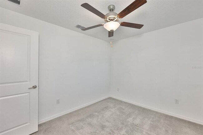 Building Photo - 9913 Jackfruit Ct