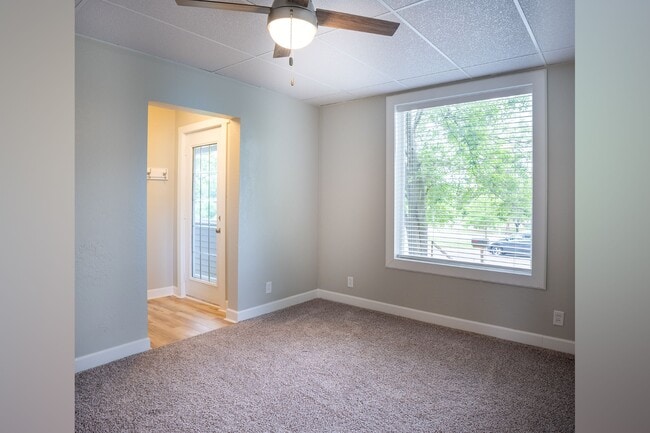 Living room. Large windows, great views! - 222 6th Ave SE