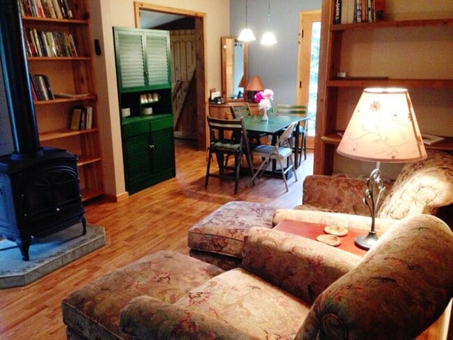 The livingroom and diningroom areas & built-in bookcases. Walls are now white and updated. - 6012 Highway 61
