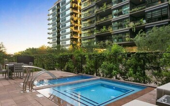 Building Photo - Experience luxury living in this exquisite...