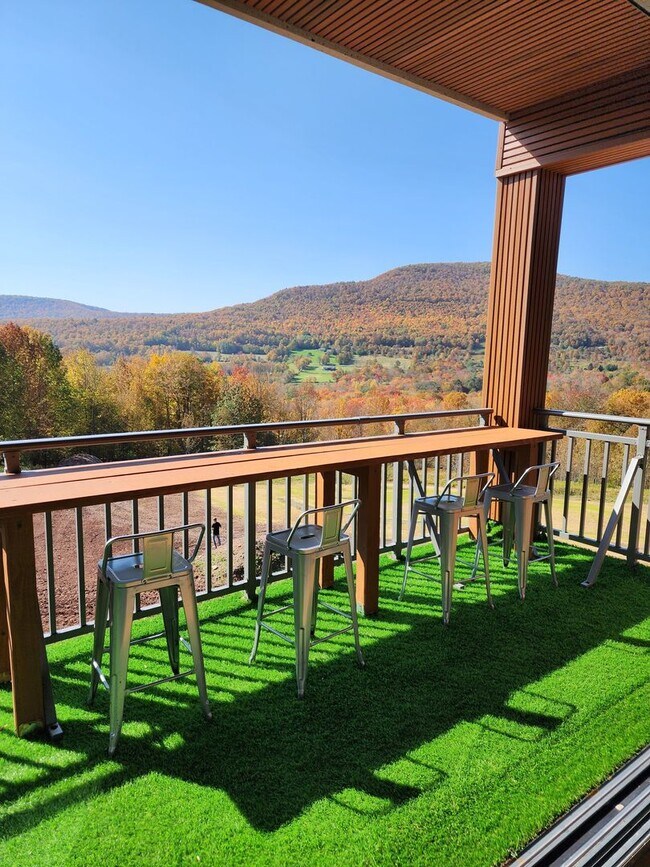 Building Photo - Modern Mountain Retreat with Rooftop Hot T...
