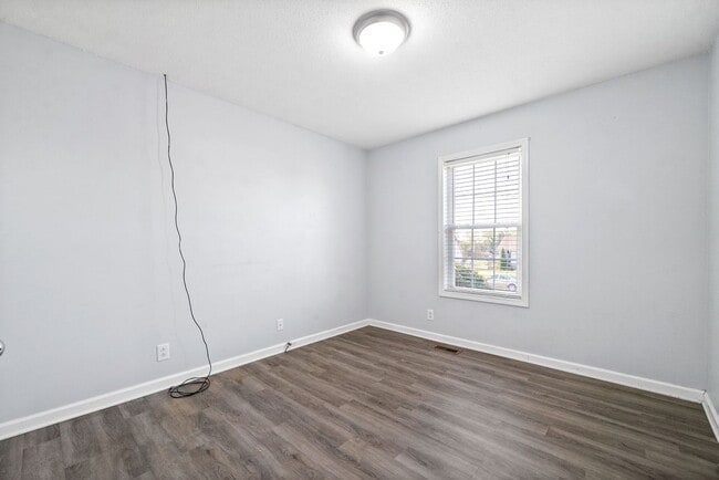 Building Photo - Adorable home with fenced back yard coming...