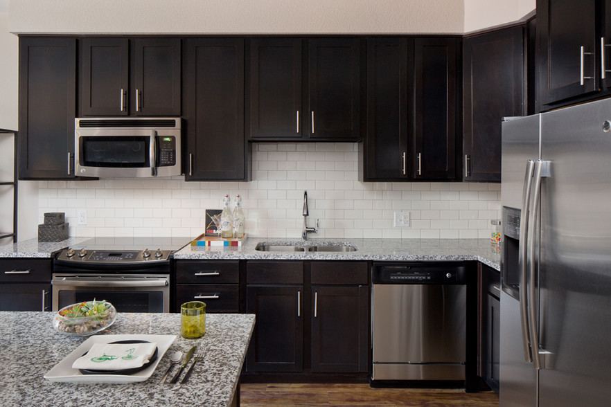 Stainless steel appliances and granite countertops - The Battery on Blake Street